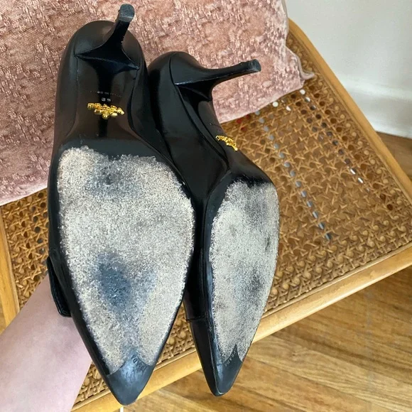 Prada Black Pointed-Toe Leather Pumps with Silver Circular Accent - Picture 5 of 7